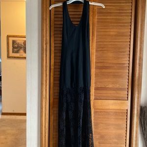 Black dress for a night out with the back that shows the back .